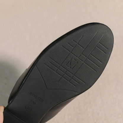 Classic Black Leather Loafers with Signature Metal Accent